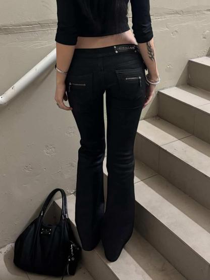 Low Rise Waxed Denim Flare Jeans