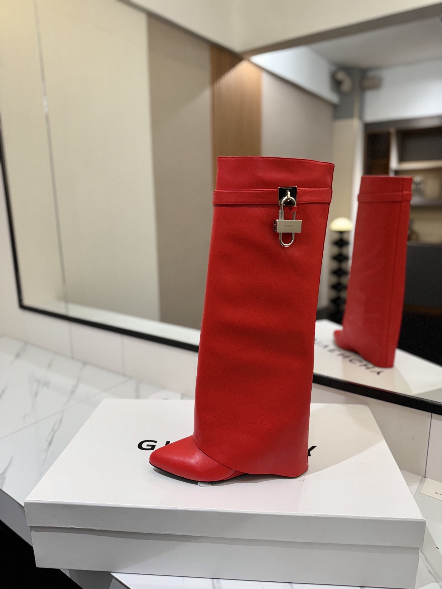 High-heeled buckle boots