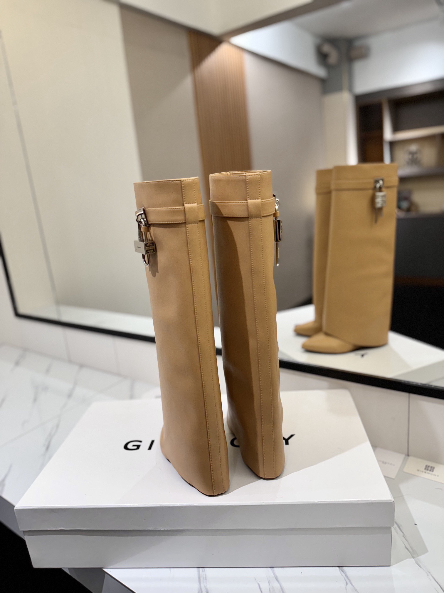 High-heeled buckle boots
