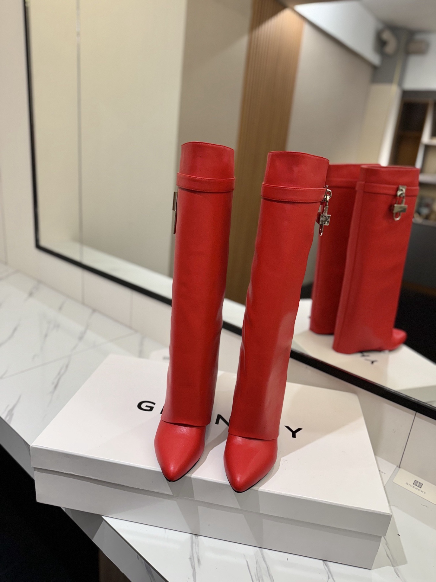 High-heeled buckle boots