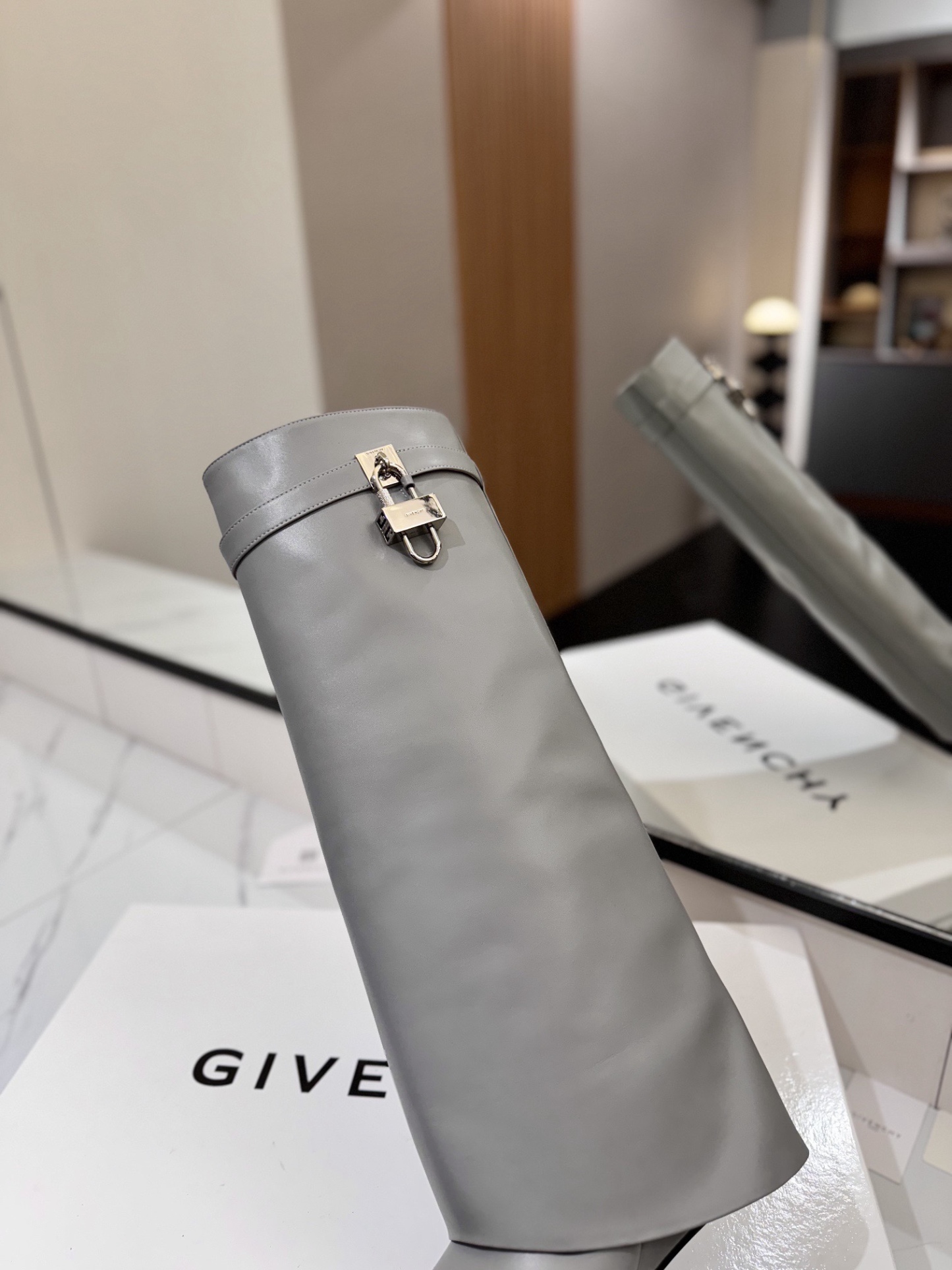 High-heeled buckle boots