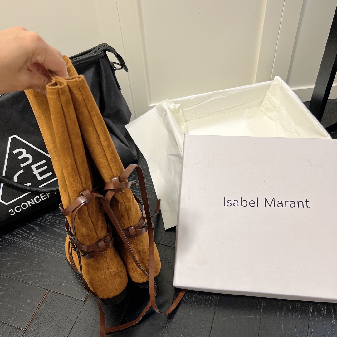 Isabel Marant strips style high knee boots-Luxeon