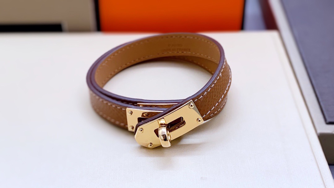 Brown with gold buckle