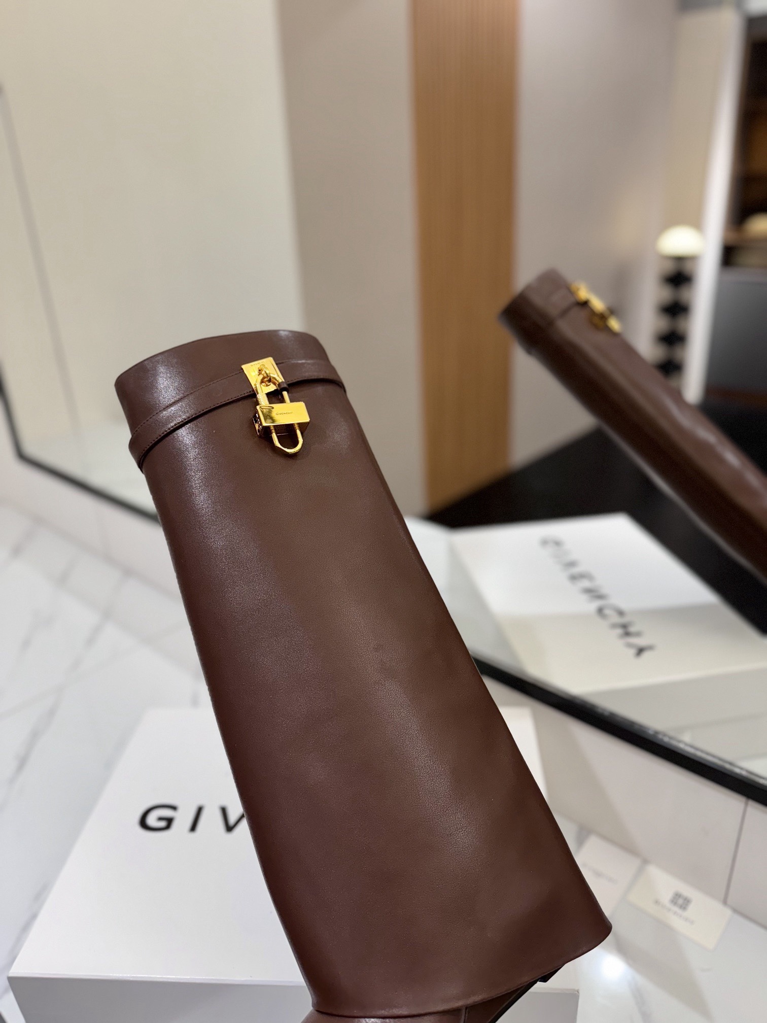 High-heeled buckle boots