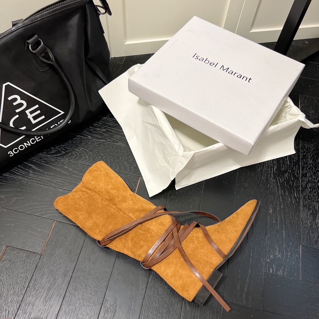 Isabel Marant strips style high knee boots-Luxeon