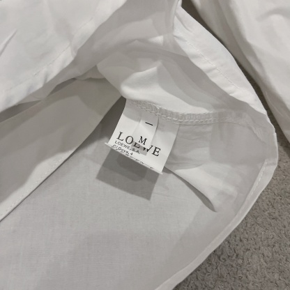 L style Irregular leather patch long-sleeved shirt