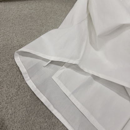 L style Irregular leather patch long-sleeved shirt