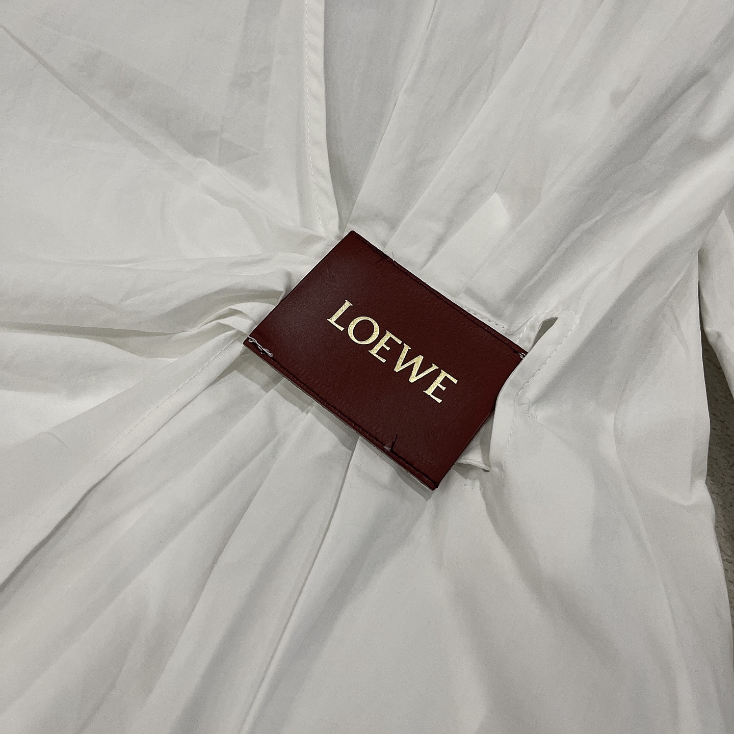 L style Irregular leather patch long-sleeved shirt