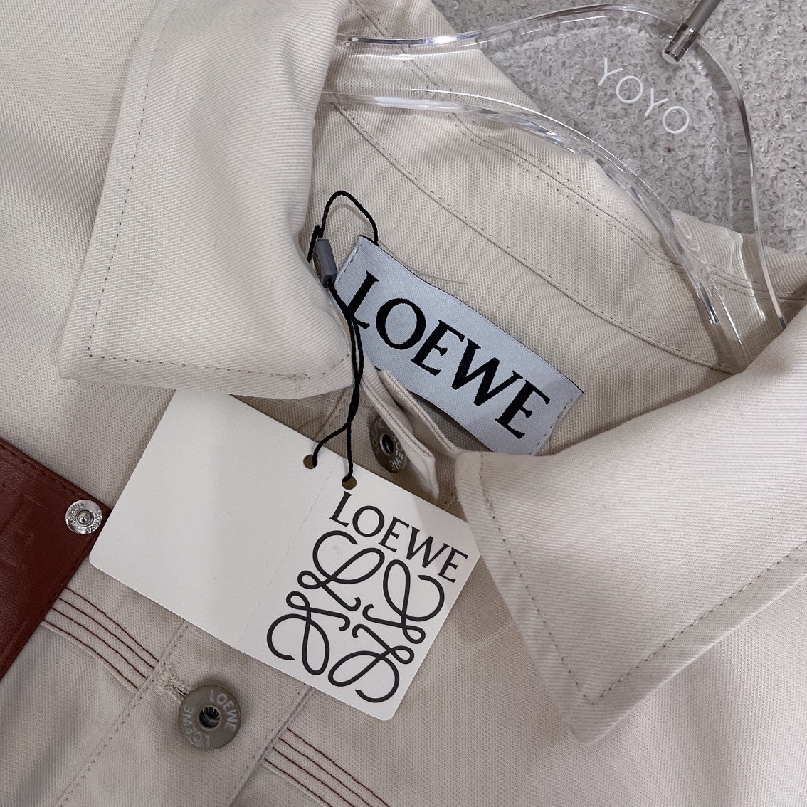 L style Denim jacket with leather patch pockets and lapel