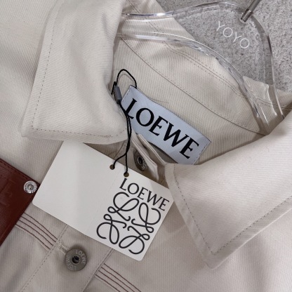 L style Denim jacket with leather patch pockets and lapel