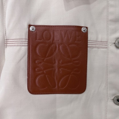 L style Denim jacket with leather patch pockets and lapel