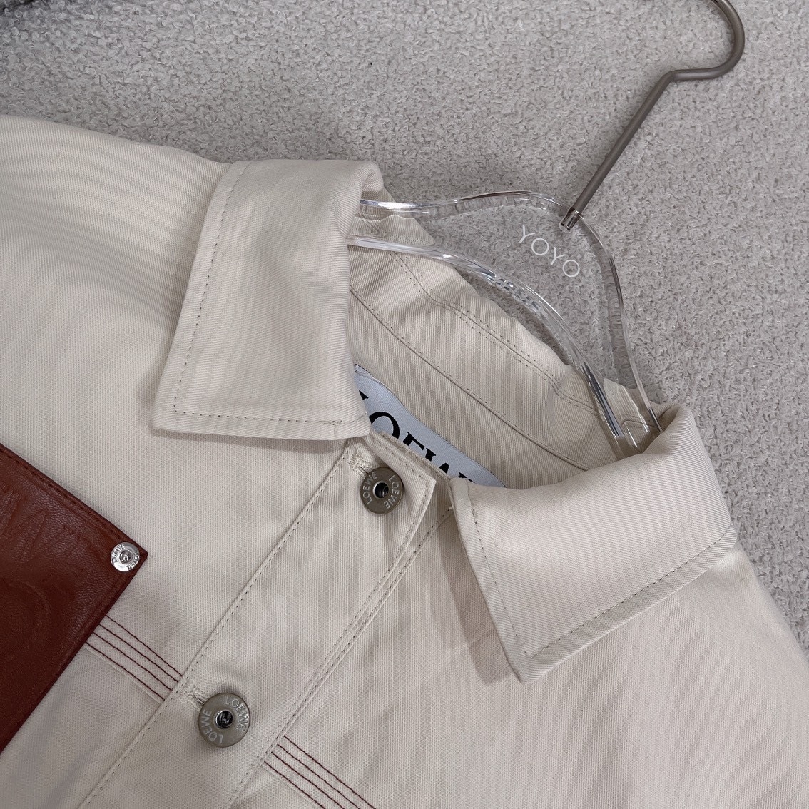 L style Denim jacket with leather patch pockets and lapel