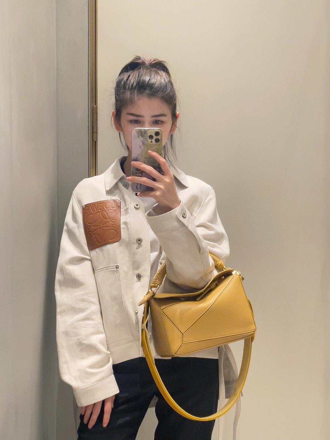 L style Denim jacket with leather patch pockets and lapel