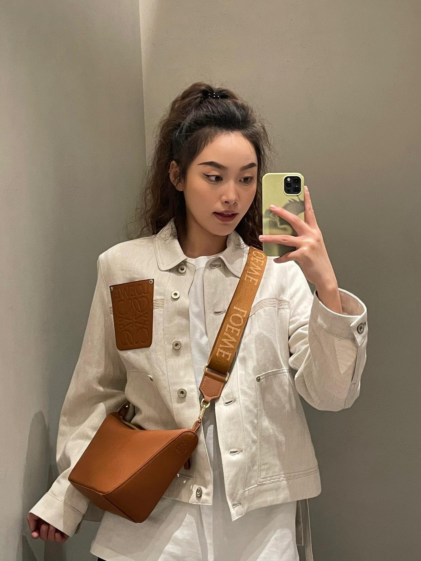 L style Denim jacket with leather patch pockets and lapel