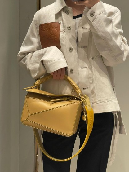 L style Denim jacket with leather patch pockets and lapel