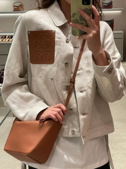 L style Denim jacket with leather patch pockets and lapel