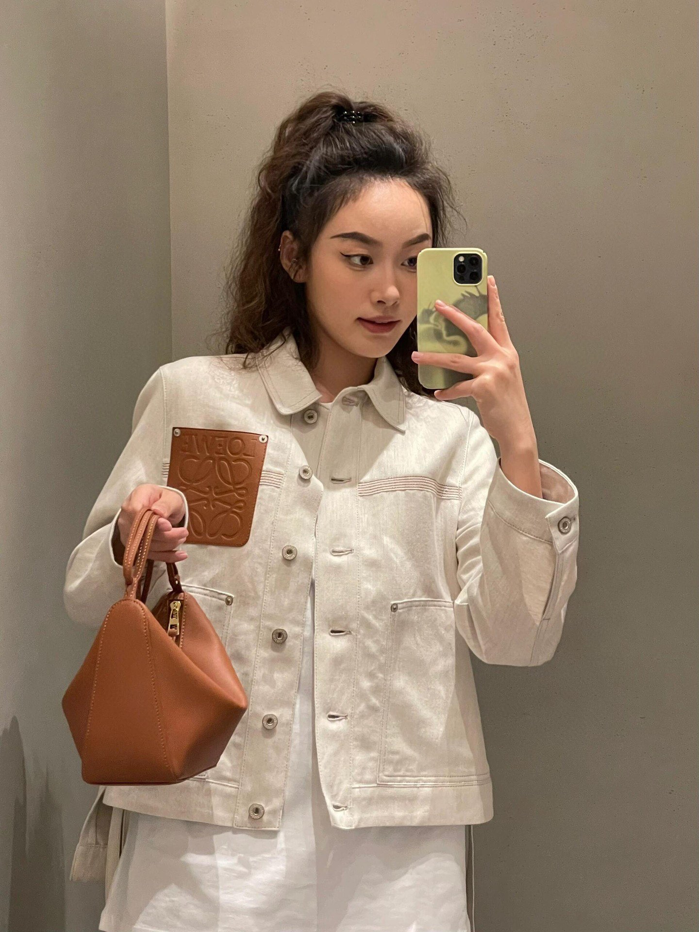 L style Denim jacket with leather patch pockets and lapel