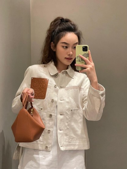 L style Denim jacket with leather patch pockets and lapel