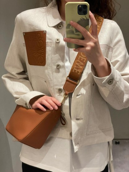 L style Denim jacket with leather patch pockets and lapel