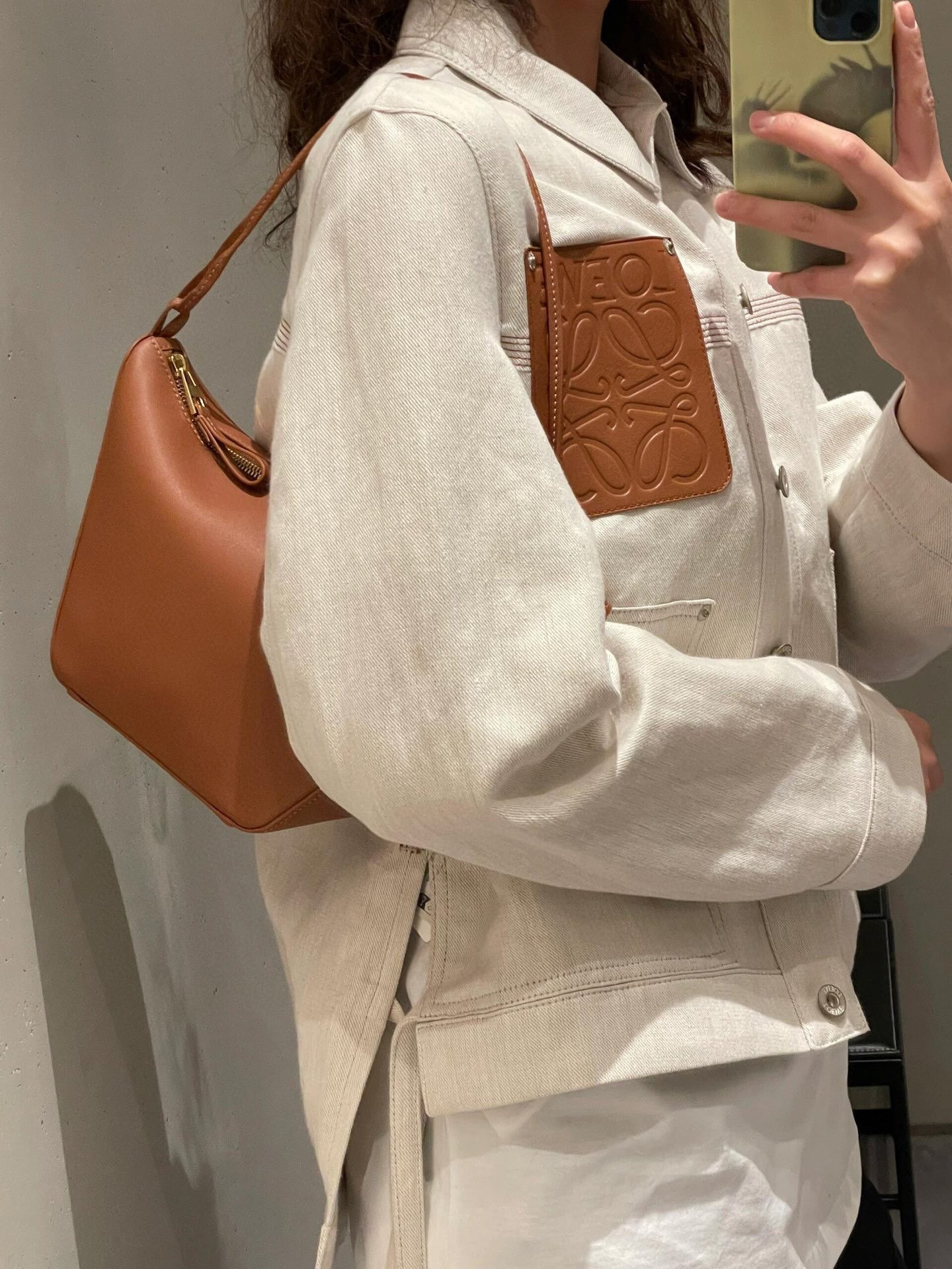 L style Denim jacket with leather patch pockets and lapel