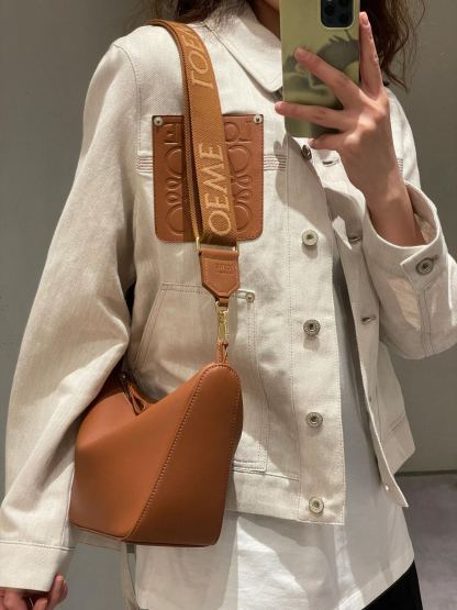 L style Denim jacket with leather patch pockets and lapel