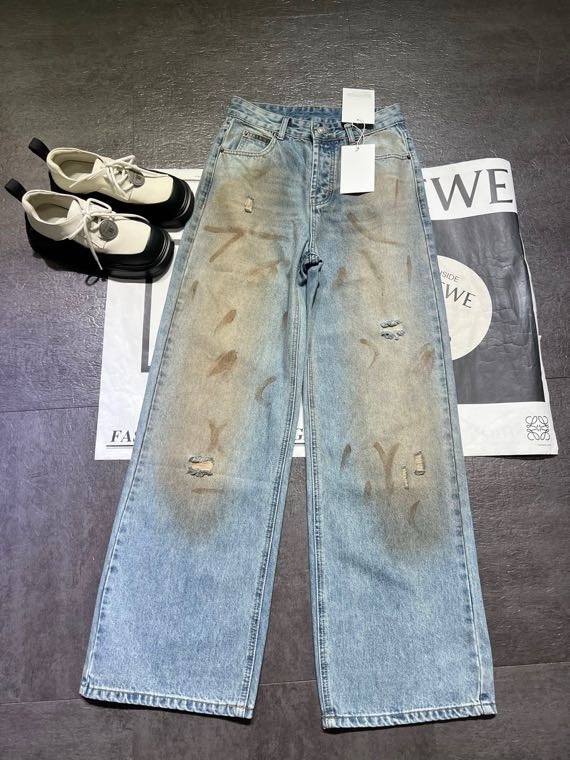 Slightly ripped, mud-dyed, distressed, washed, and dirty pants