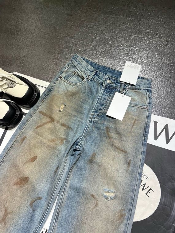 Slightly ripped, mud-dyed, distressed, washed, and dirty pants