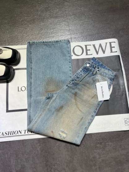 Slightly ripped, mud-dyed, distressed, washed, and dirty pants