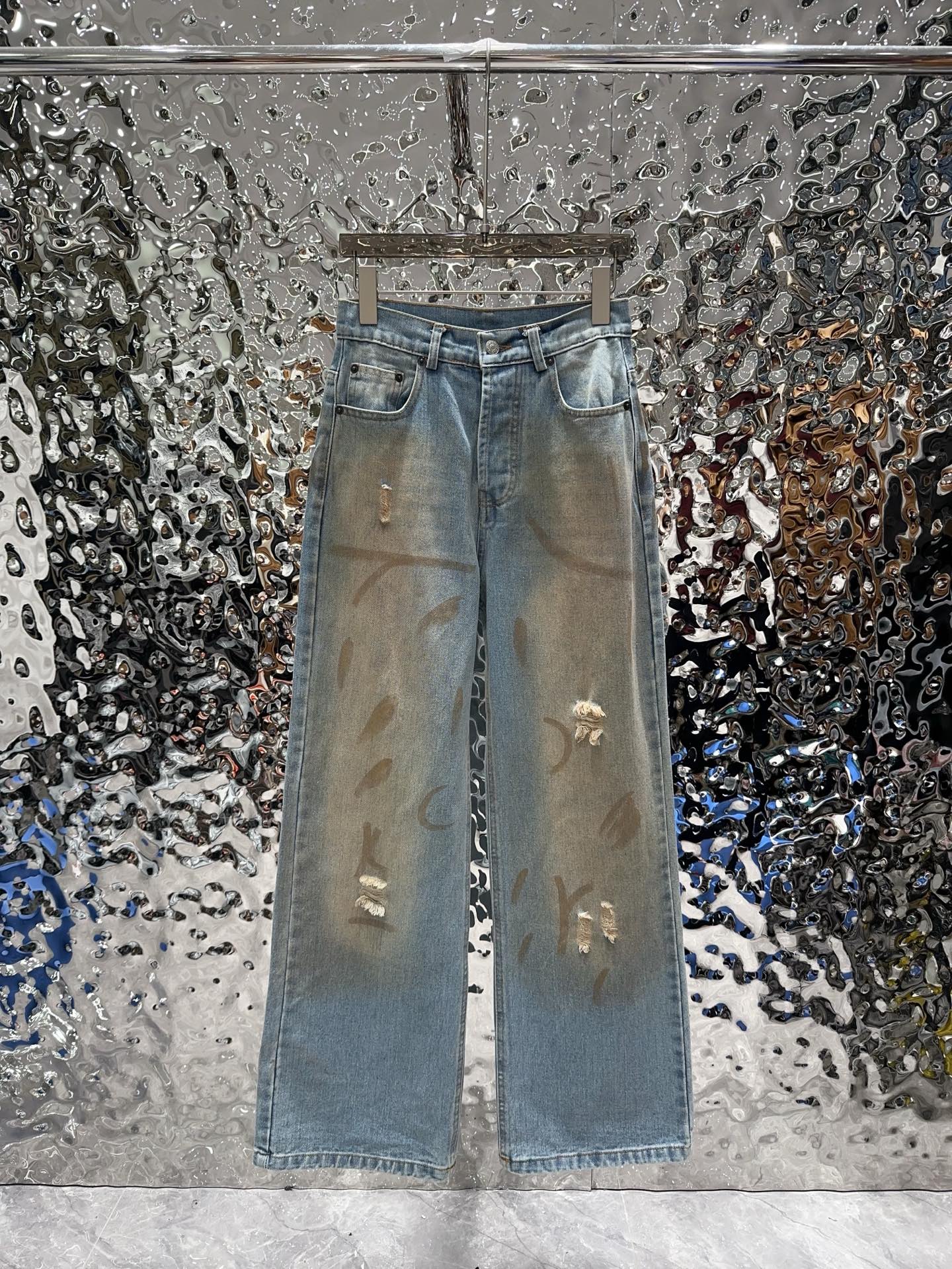 Slightly ripped, mud-dyed, distressed, washed, and dirty pants