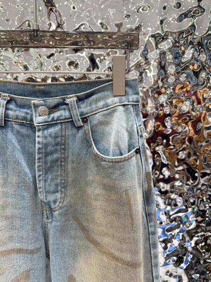 Slightly ripped, mud-dyed, distressed, washed, and dirty pants