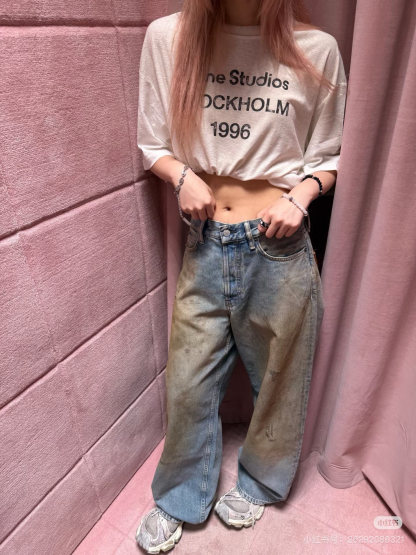 Slightly ripped, mud-dyed, distressed, washed, and dirty pants