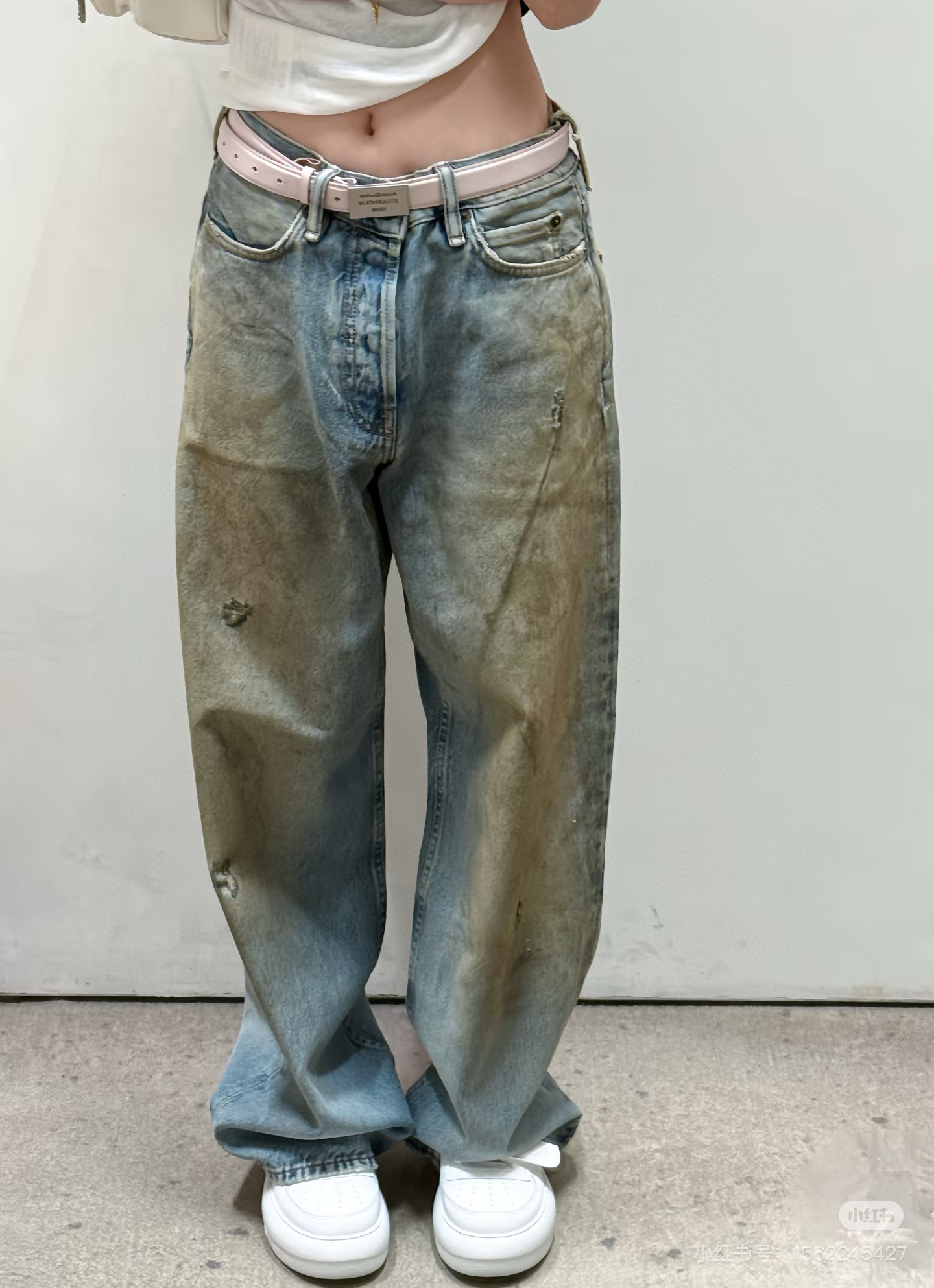 Slightly ripped, mud-dyed, distressed, washed, and dirty pants