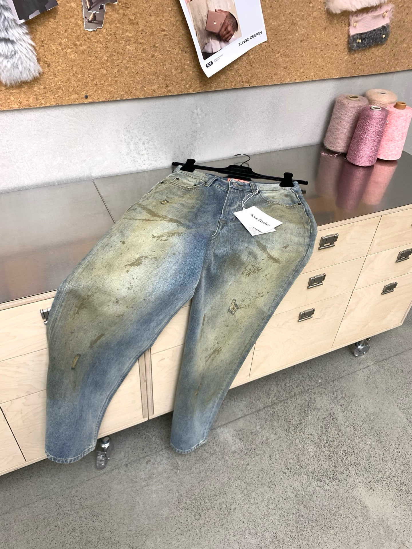 Slightly ripped, mud-dyed, distressed, washed, and dirty pants