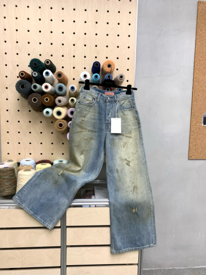 Slightly ripped, mud-dyed, distressed, washed, and dirty pants