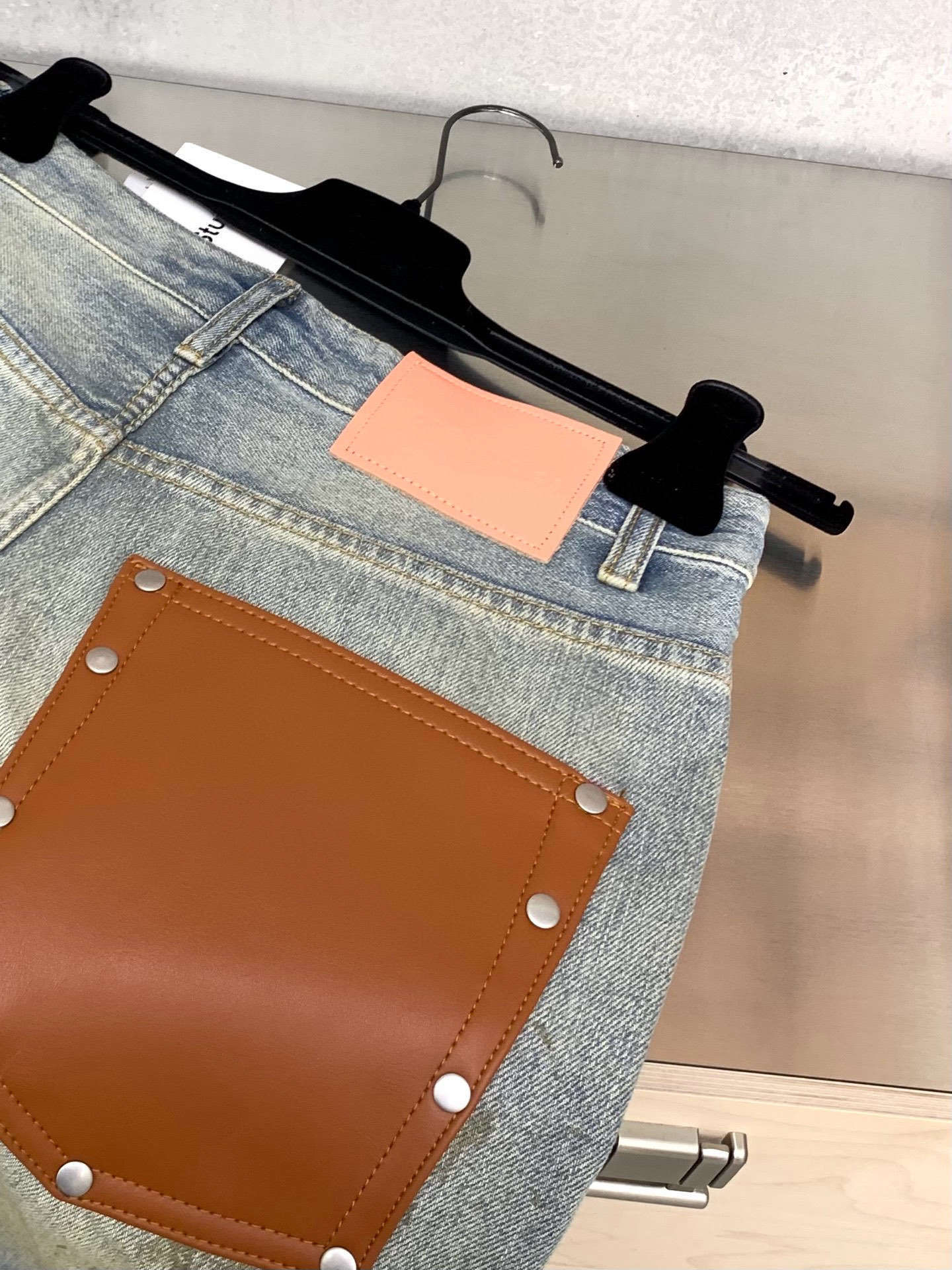 Slightly ripped, mud-dyed, distressed, washed, and dirty pants