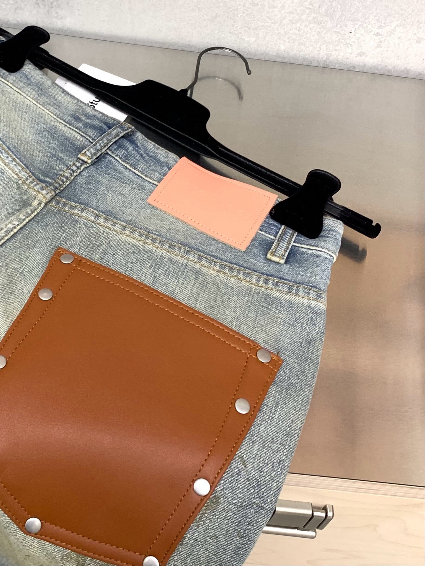 Slightly ripped, mud-dyed, distressed, washed, and dirty pants