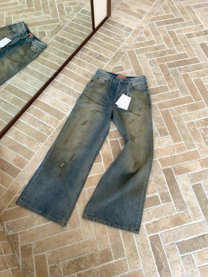 Slightly ripped, mud-dyed, distressed, washed, and dirty pants