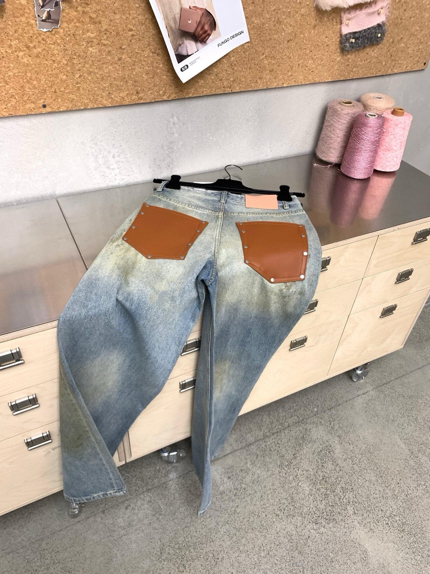 Slightly ripped, mud-dyed, distressed, washed, and dirty pants