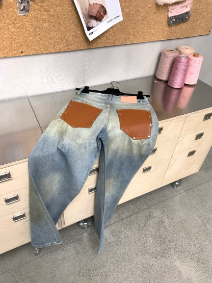 Slightly ripped, mud-dyed, distressed, washed, and dirty pants