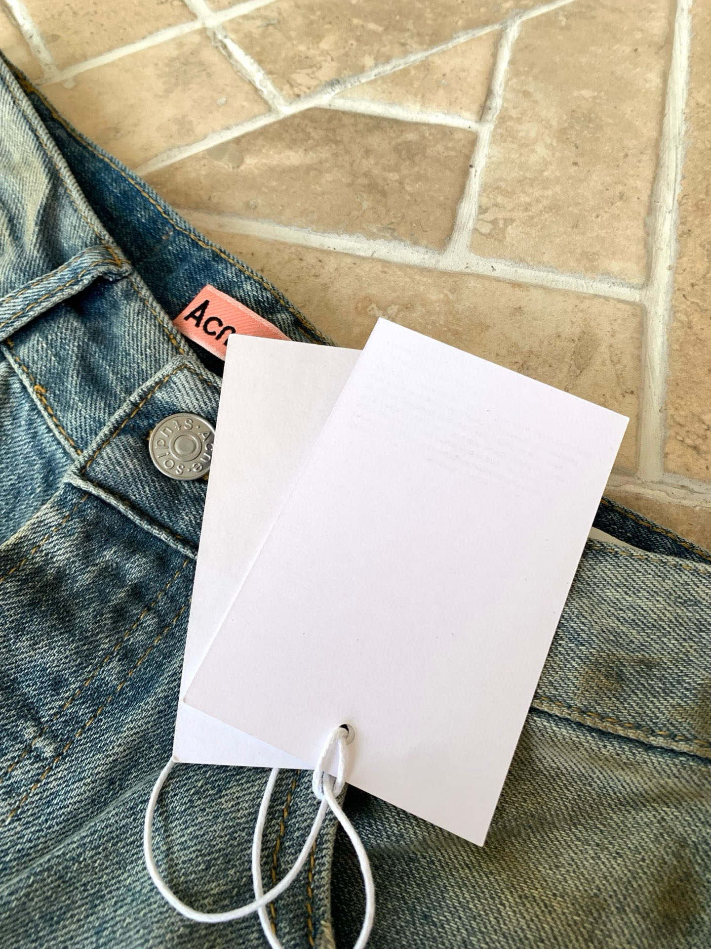 Slightly ripped, mud-dyed, distressed, washed, and dirty pants