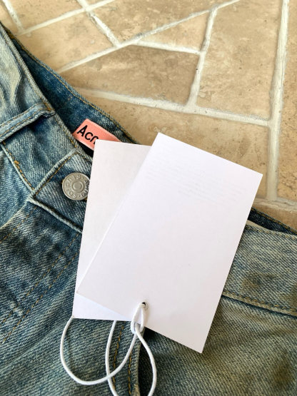 Slightly ripped, mud-dyed, distressed, washed, and dirty pants