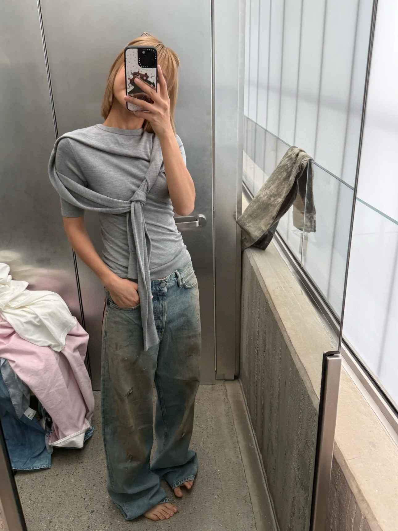 Slightly ripped, mud-dyed, distressed, washed, and dirty pants