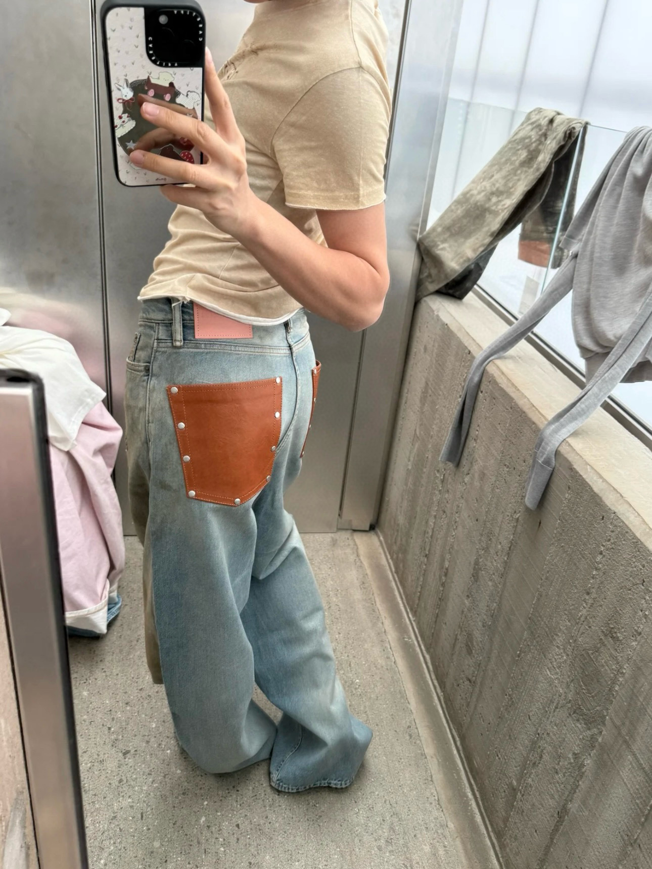 Slightly ripped, mud-dyed, distressed, washed, and dirty pants