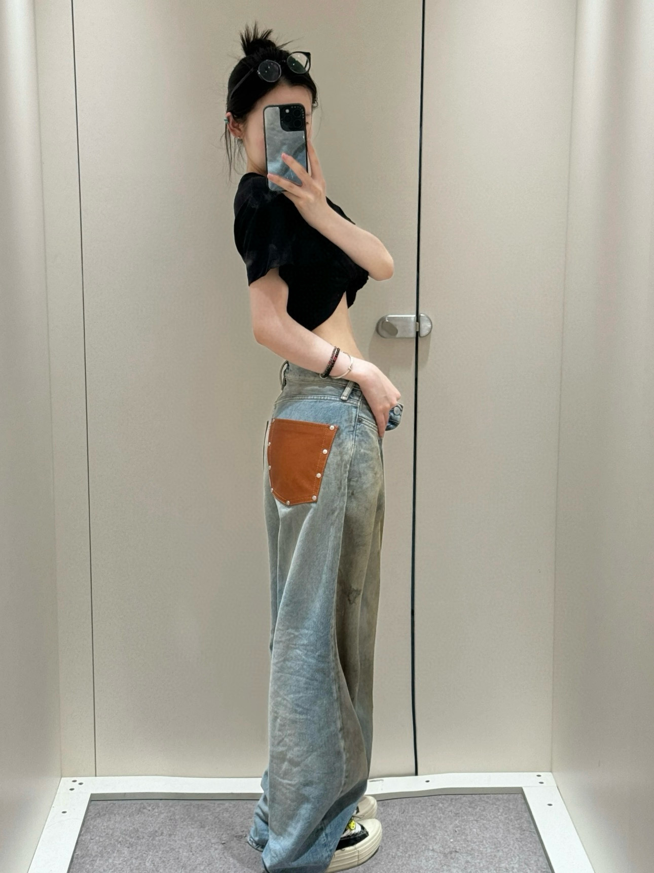 Slightly ripped, mud-dyed, distressed, washed, and dirty pants