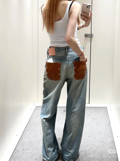 Slightly ripped, mud-dyed, distressed, washed, and dirty pants