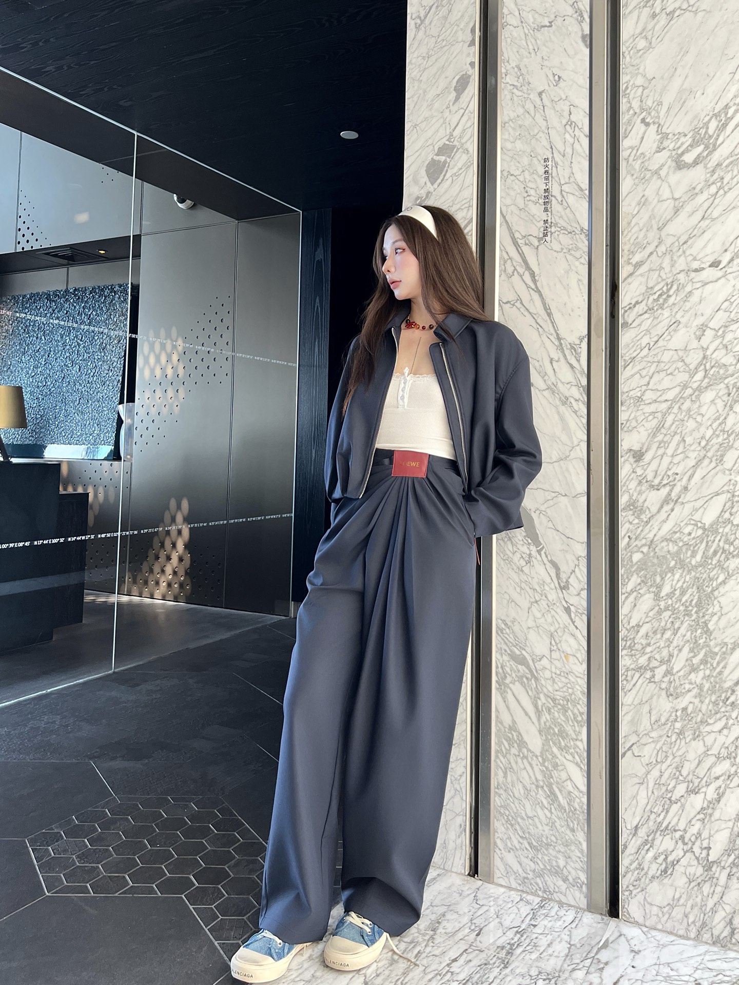 Zippered leather jacket and trousers set