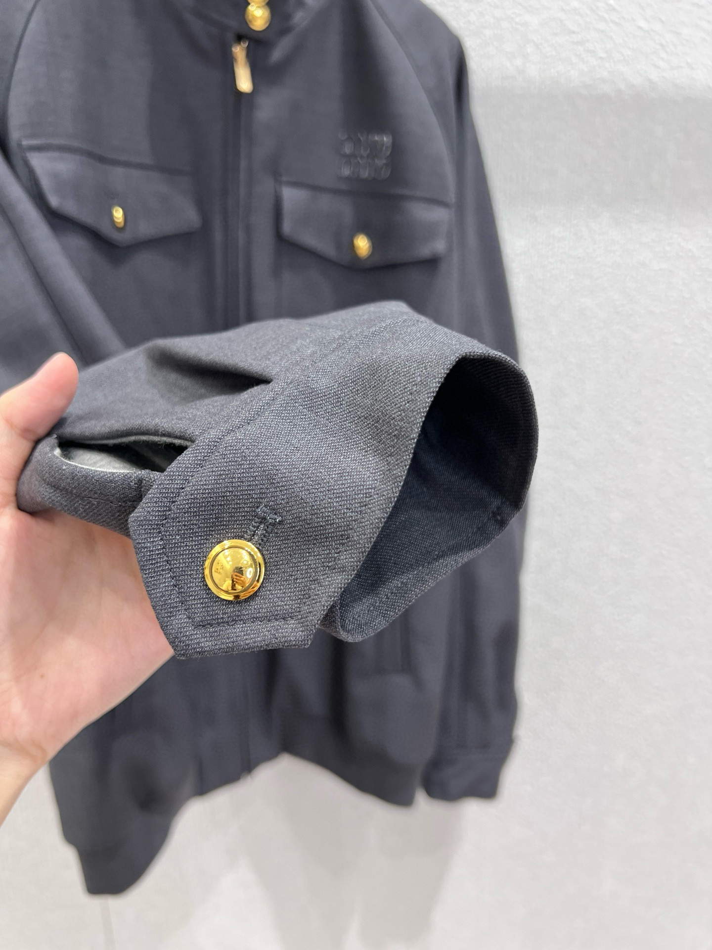 Stand-up collar appliqué zip-up jacket