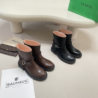 Knotted combat boots