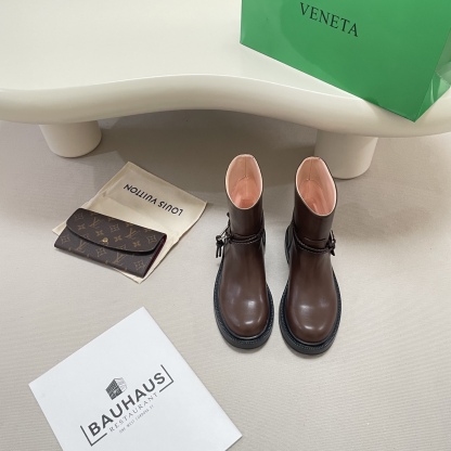 Knotted combat boots