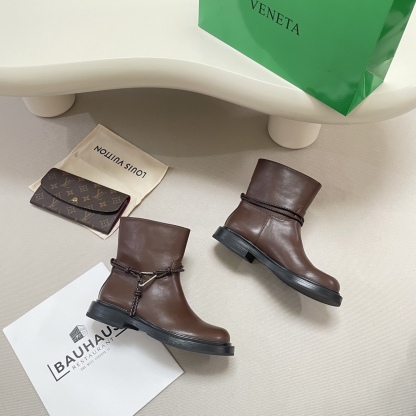 Knotted combat boots